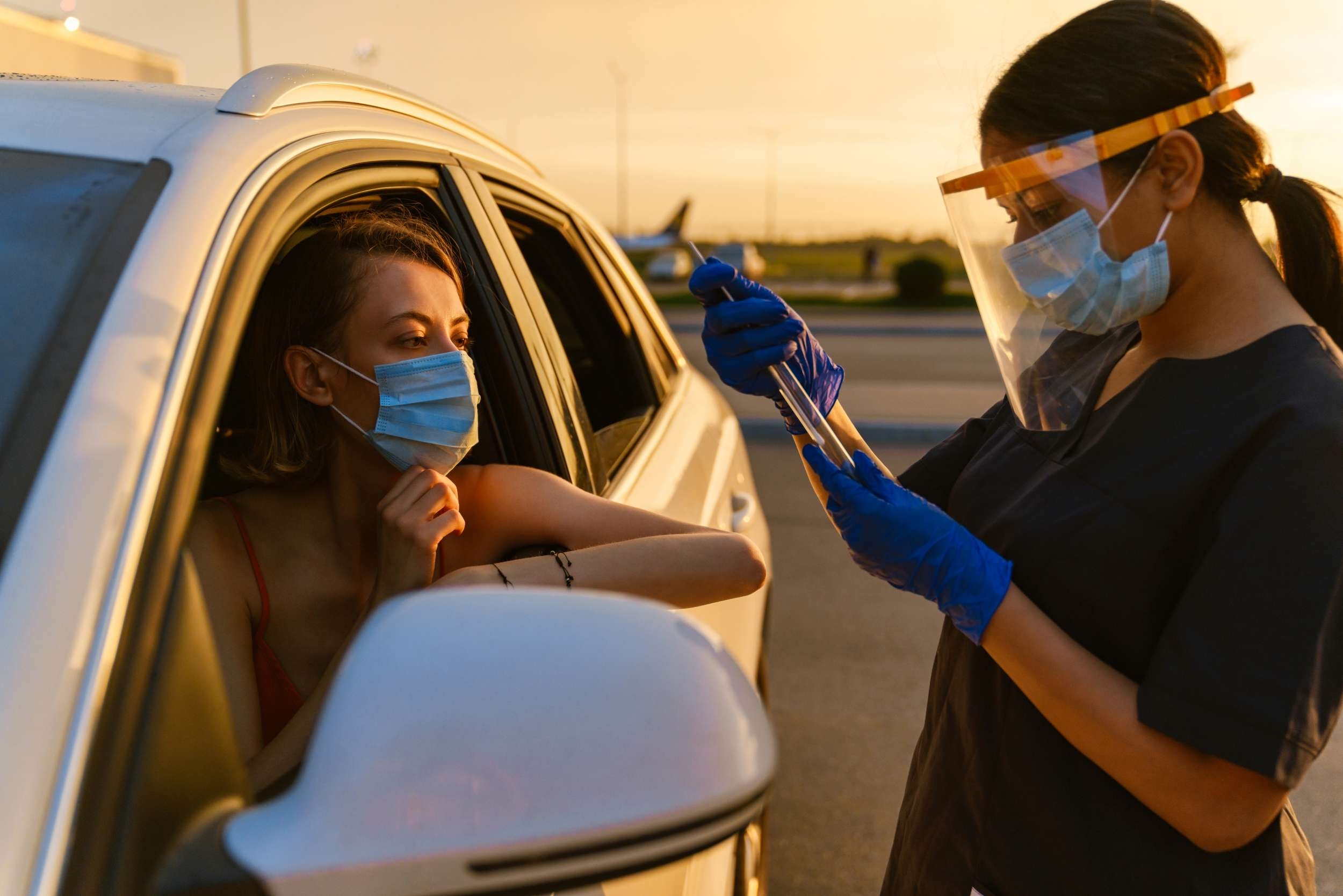 Healthcare worker administering a covid test