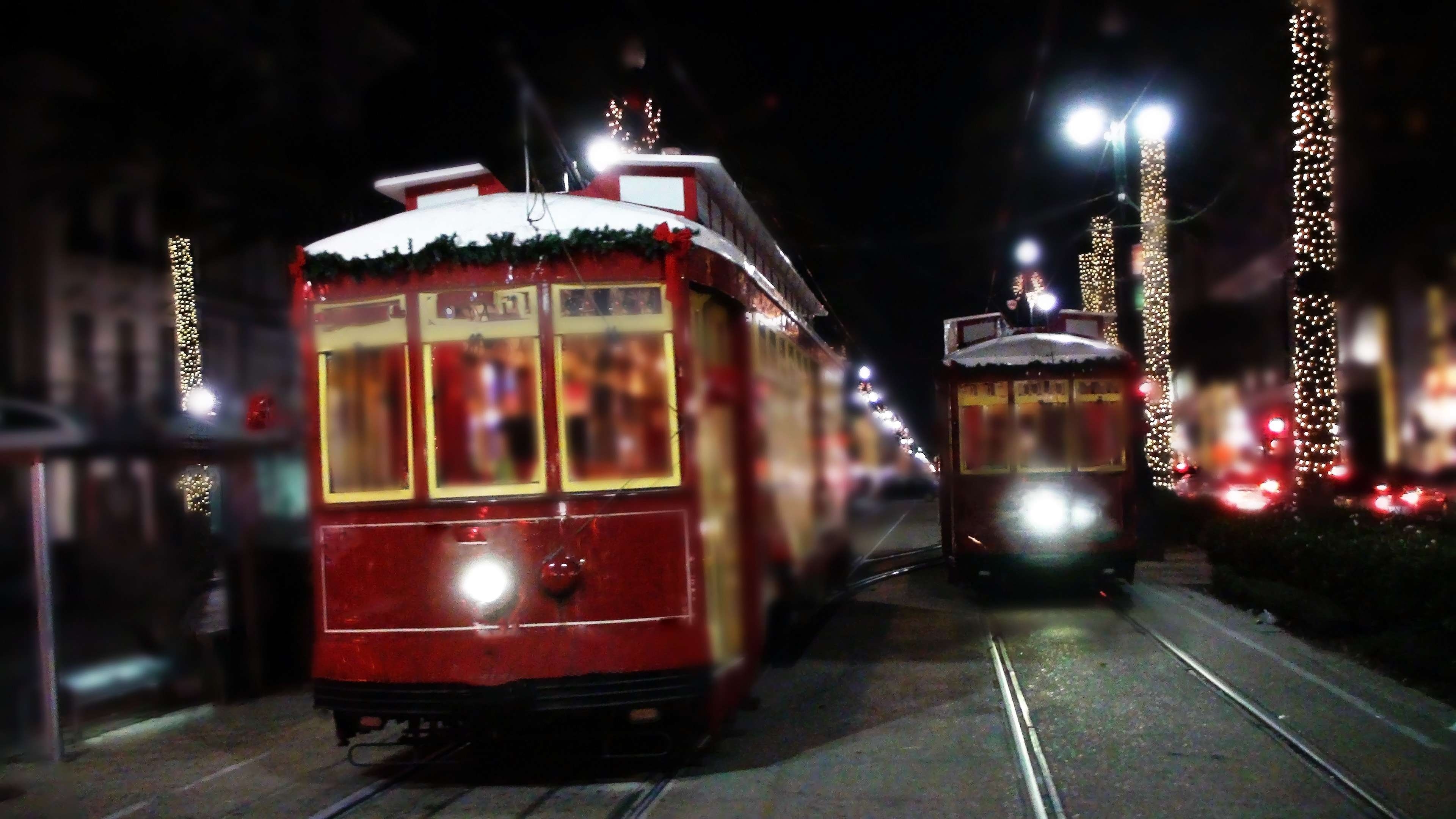 New Orleans streetcars at night during Christmas in the French Quarter