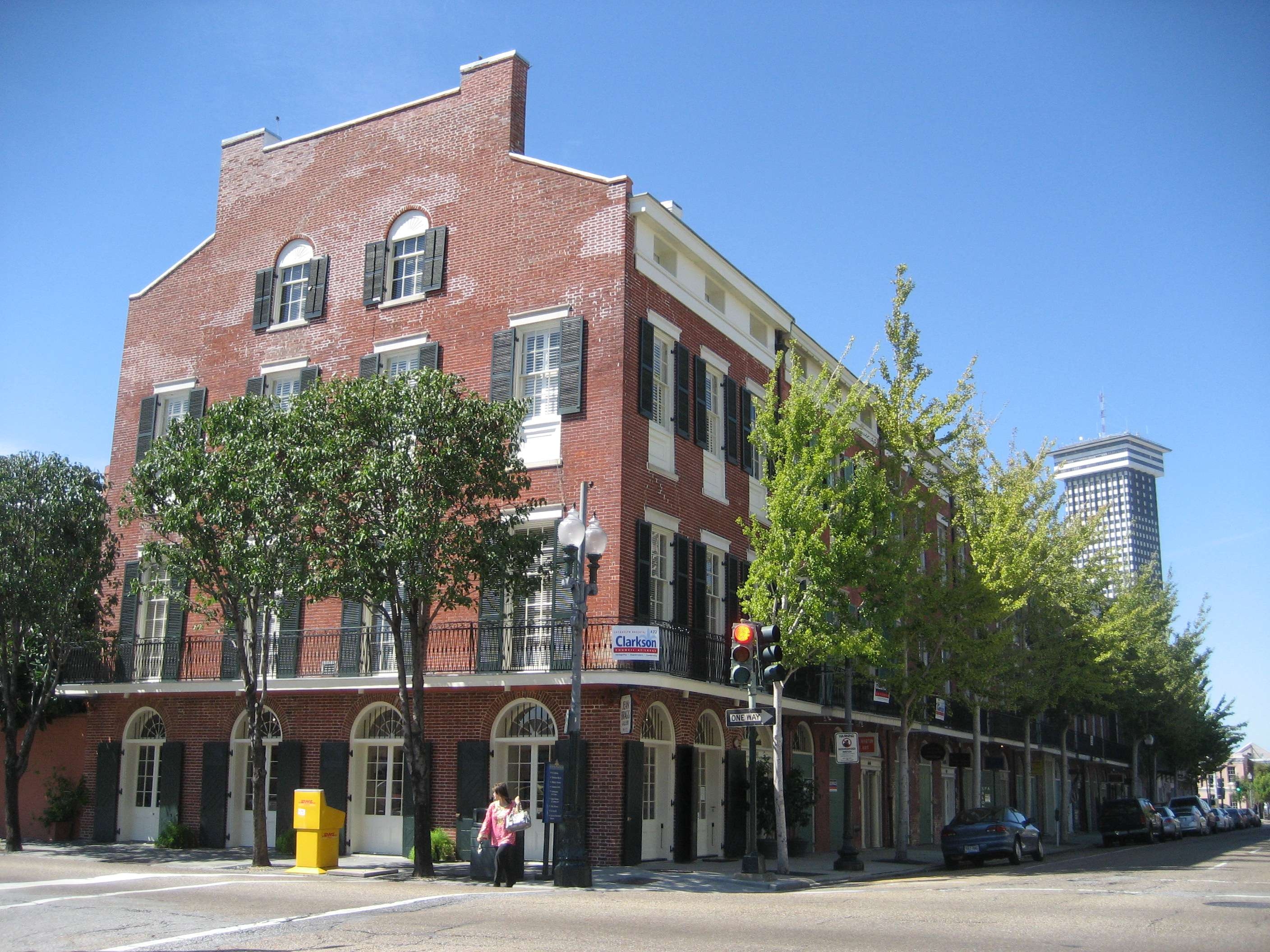 Tall red brick building on a corner on Julia Street in New Orleans, LA