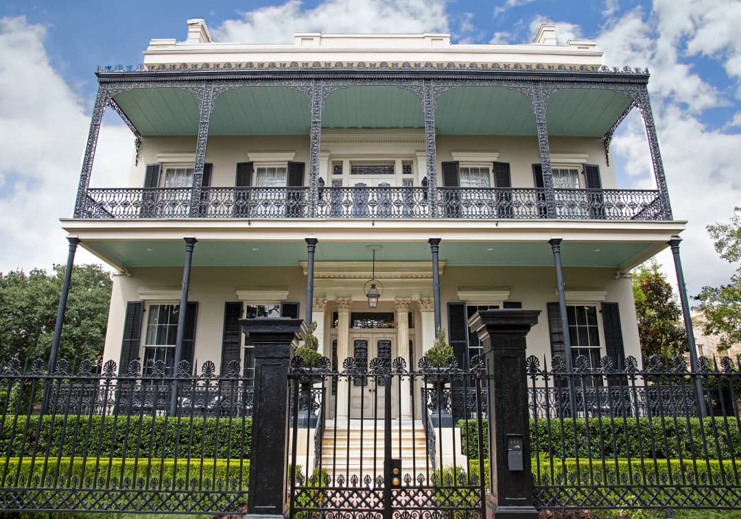 Large two-story mansion as seen on a Garden District walking tour in New Orleans