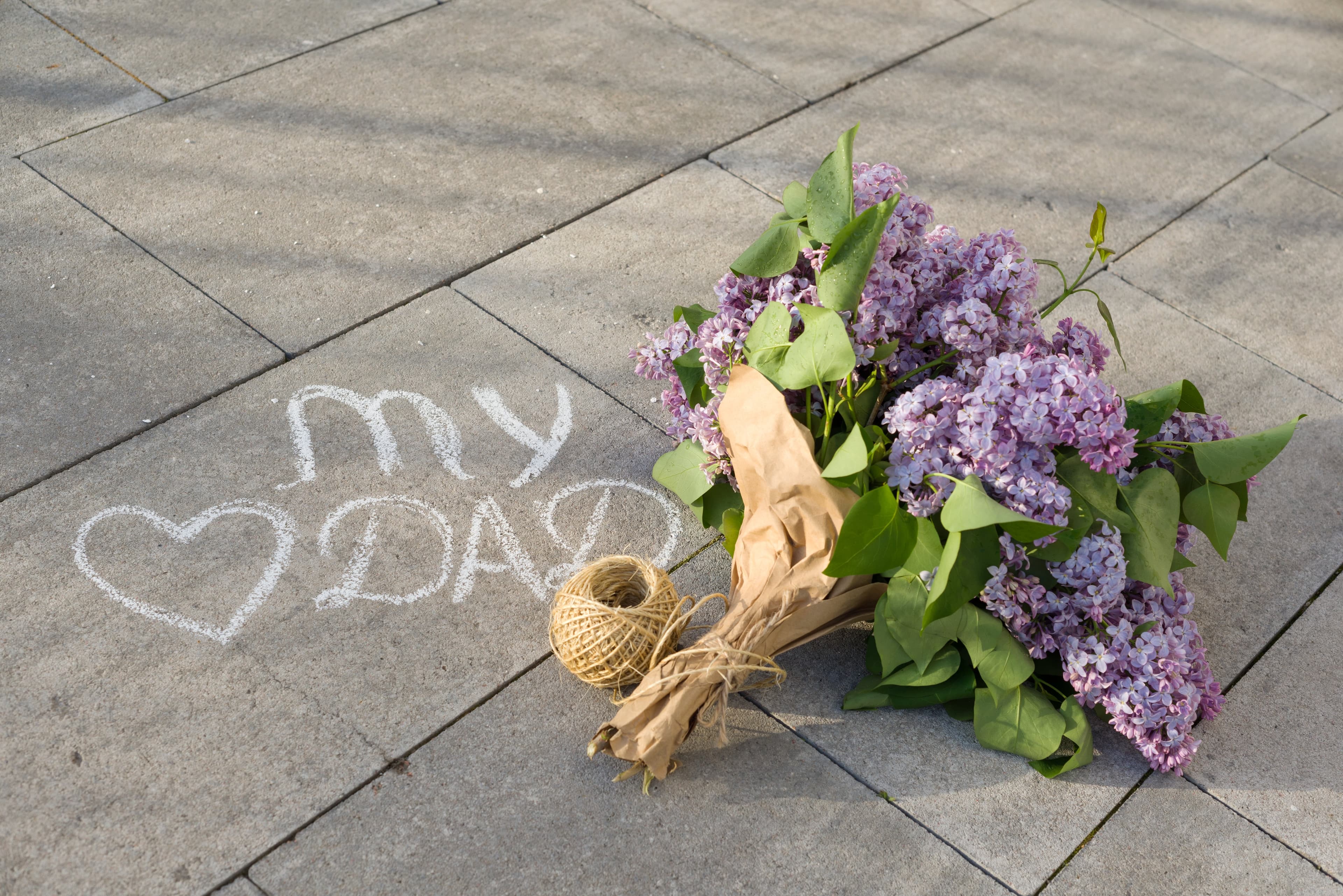 Father's Day in New Orleans greeting concept handwritten text on the asphalt