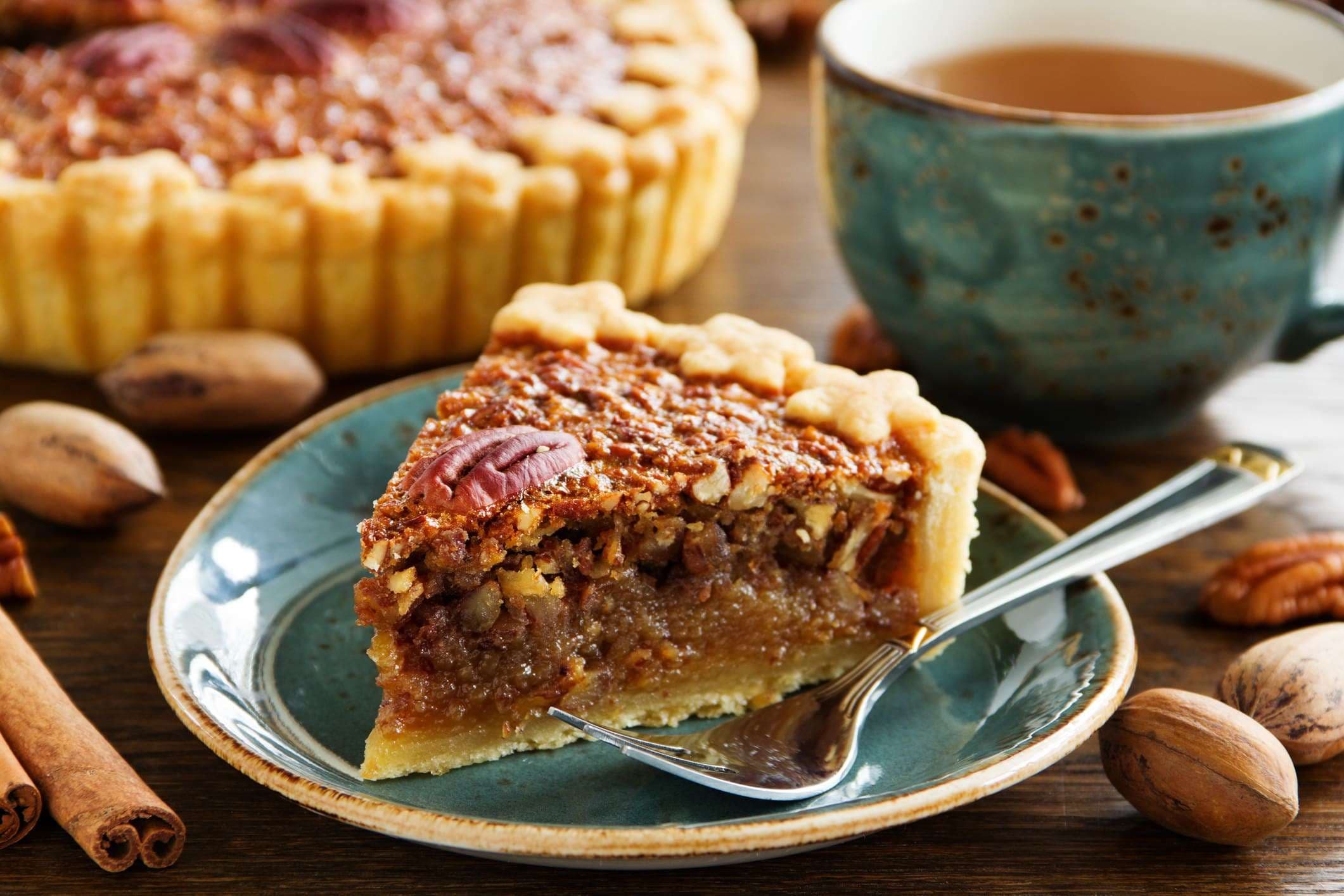 piece of pecan pie on a plate during thanksgiving in new orleans