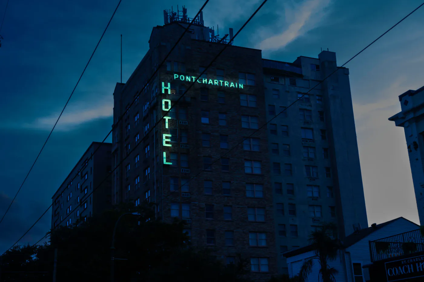 Pontchartrain Hotel neon sign at night on St. Charles Avenue